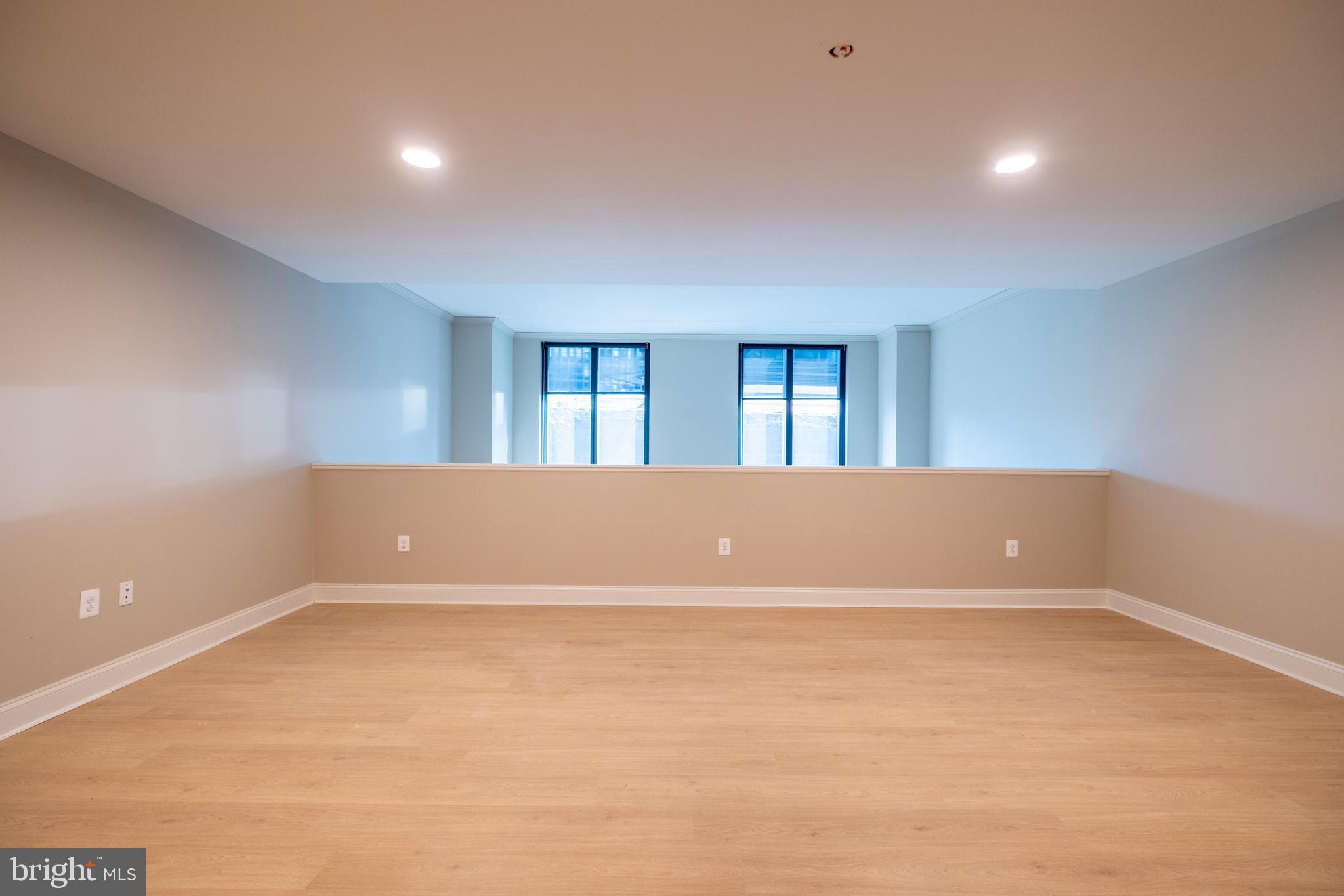 2301-61 John F Kennedy Boulevard, Unit 201 Philadelphia, PA 19103 - Photo 36 of 36 a view of an empty room with windows