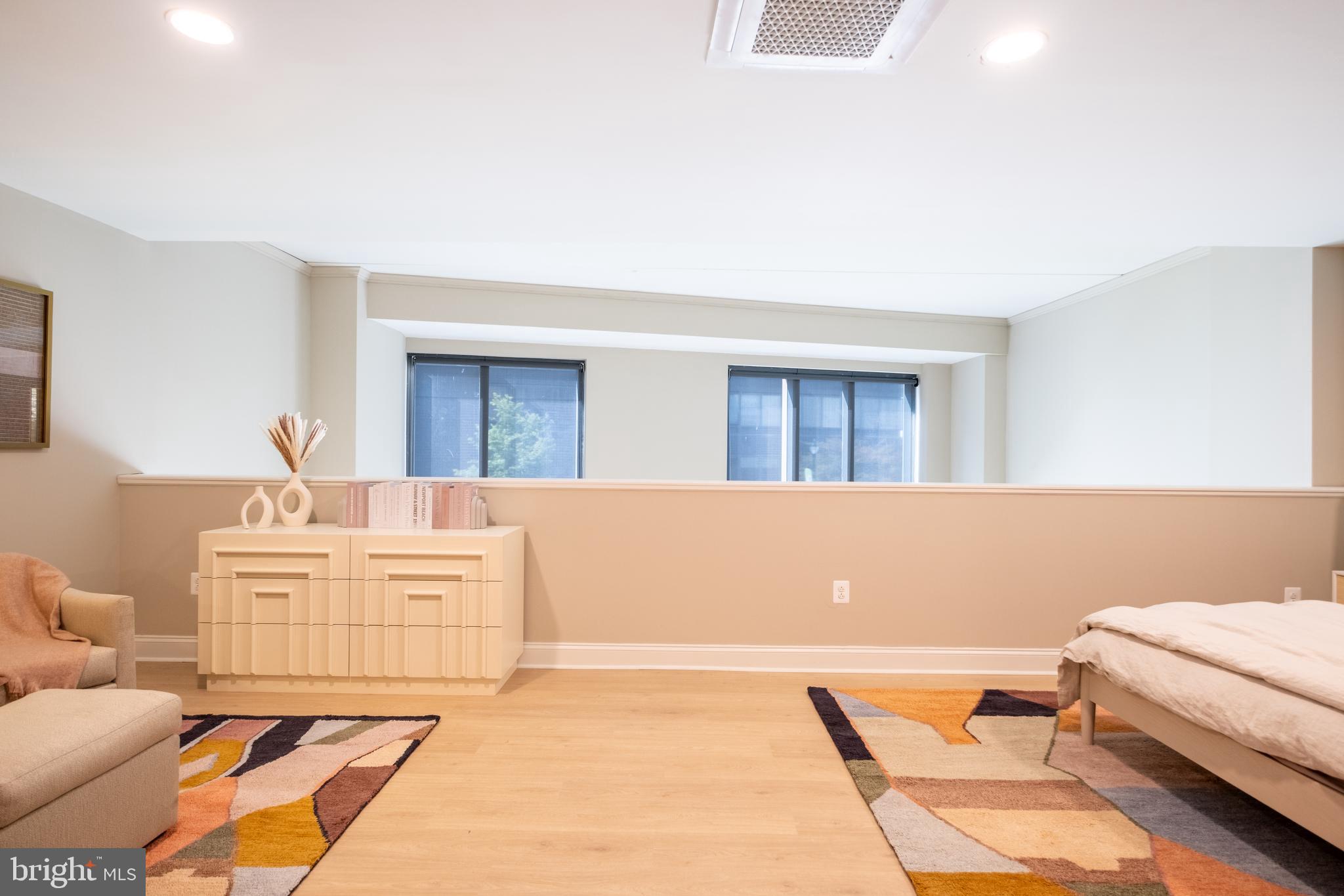 2301-61 John F Kennedy Boulevard, Unit 201 Philadelphia, PA 19103 - Photo 9 of 36 a living room with furniture