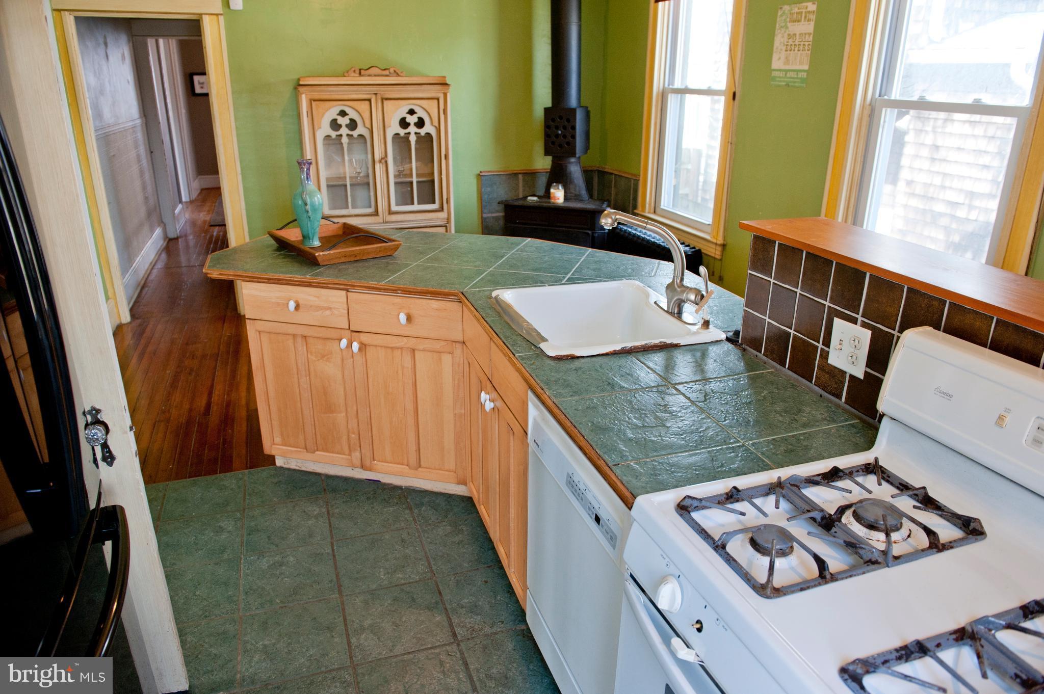 6105 York Road Baltimore, MD 21212 - Photo 13 of 24 a view of kitchen island with sink window