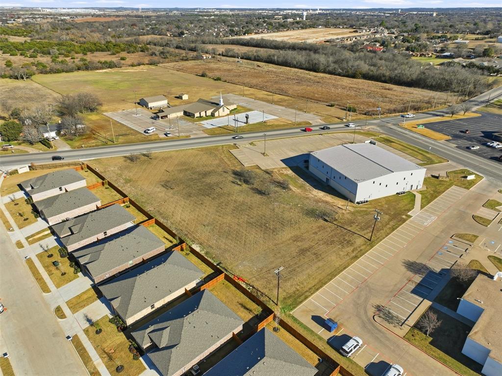 1007 Woodard Avenue Cleburne, TX 76033 - Photo 13 of 15 an aerial view of residential houses with outdoor space