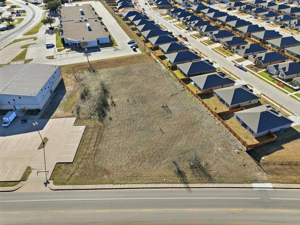 1007 Woodard Avenue Cleburne, TX 76033 - Photo 9 of 15 an aerial view of residential houses with outdoor space