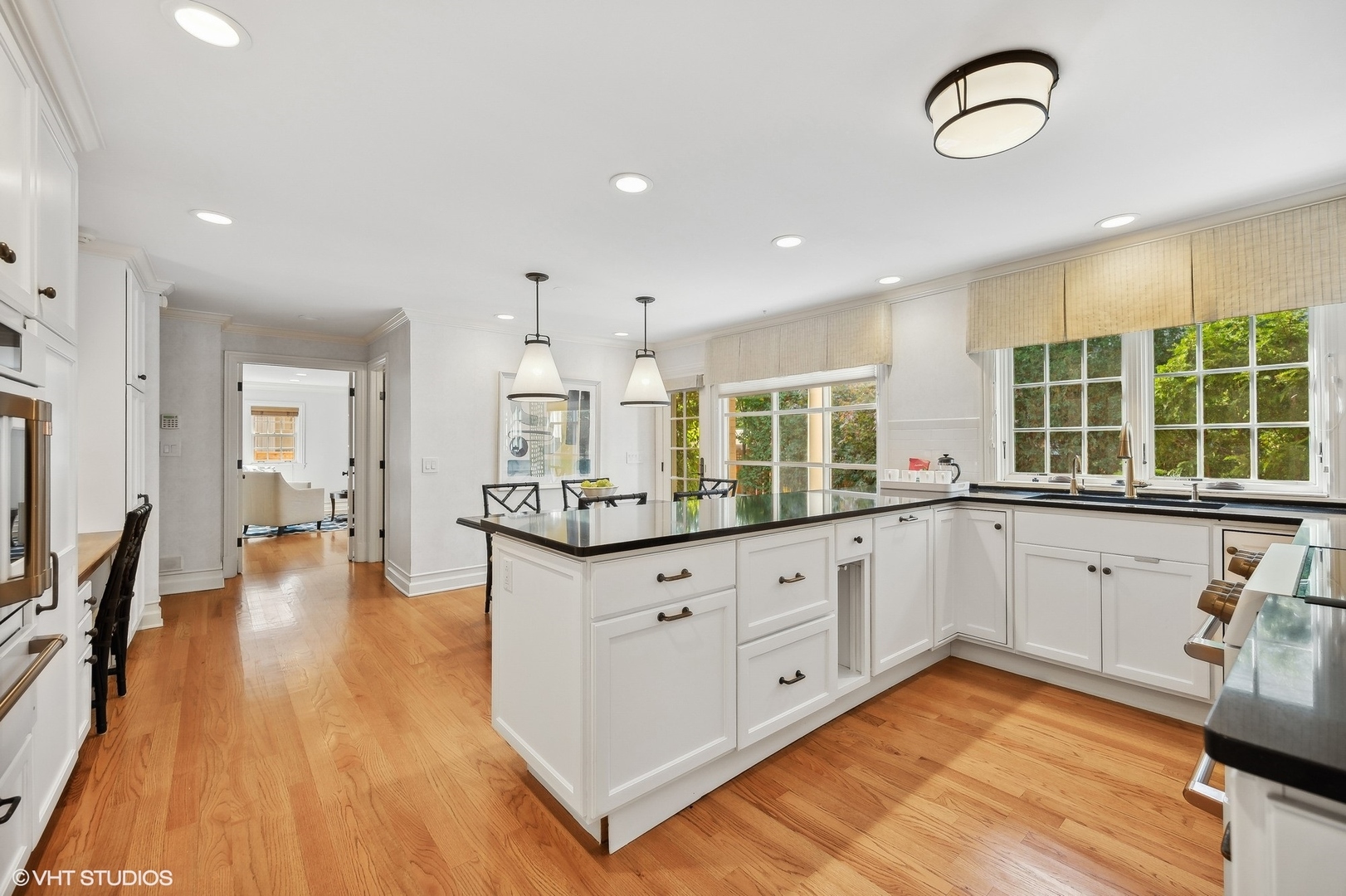 88 Abbotsford Road Winnetka, IL 60093 - Photo 16 of 46 a large kitchen with granite countertop a large counter top space and stainless steel appliances