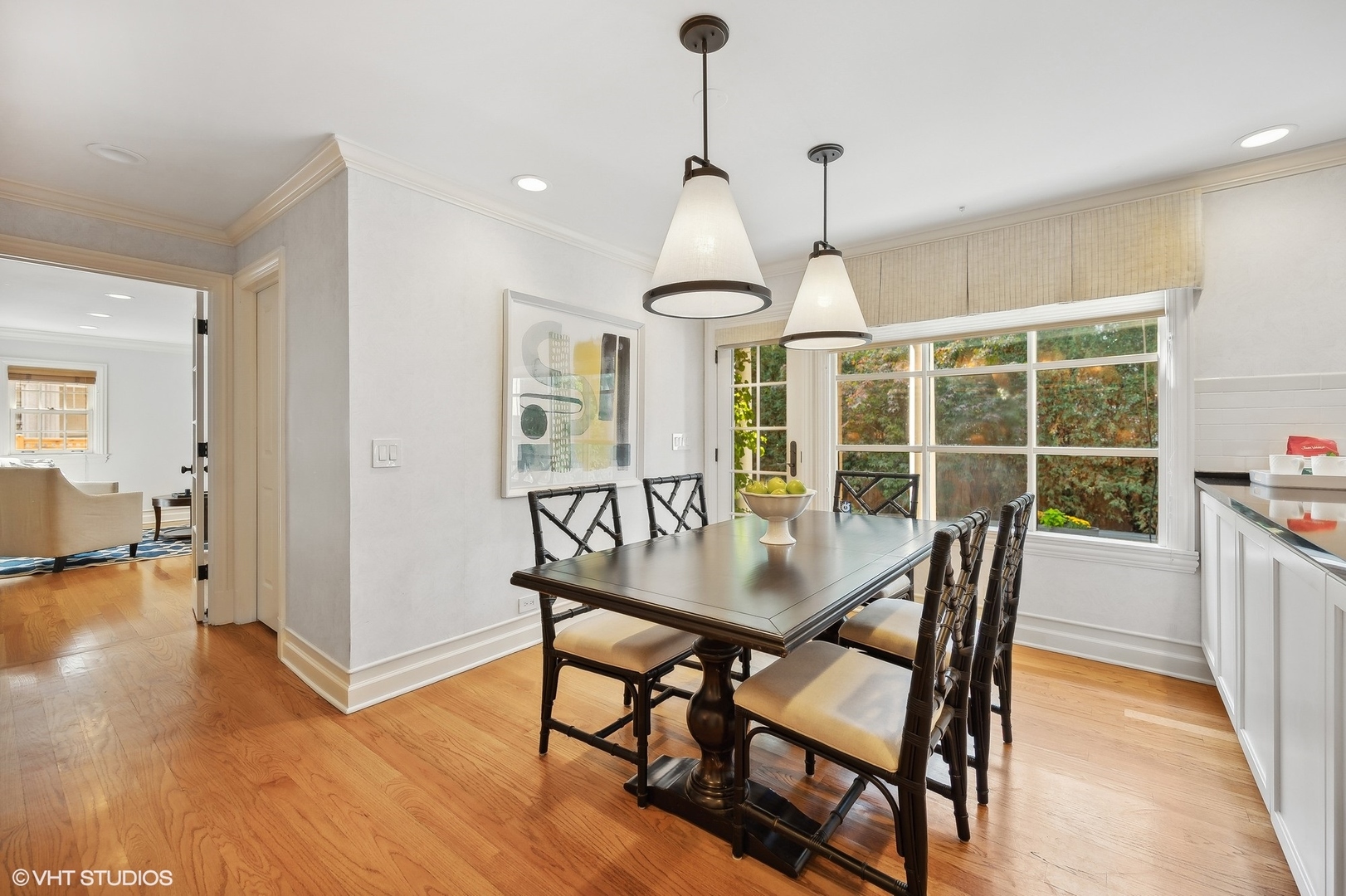 88 Abbotsford Road Winnetka, IL 60093 - Photo 20 of 46 a dining room with furniture window and wooden floor