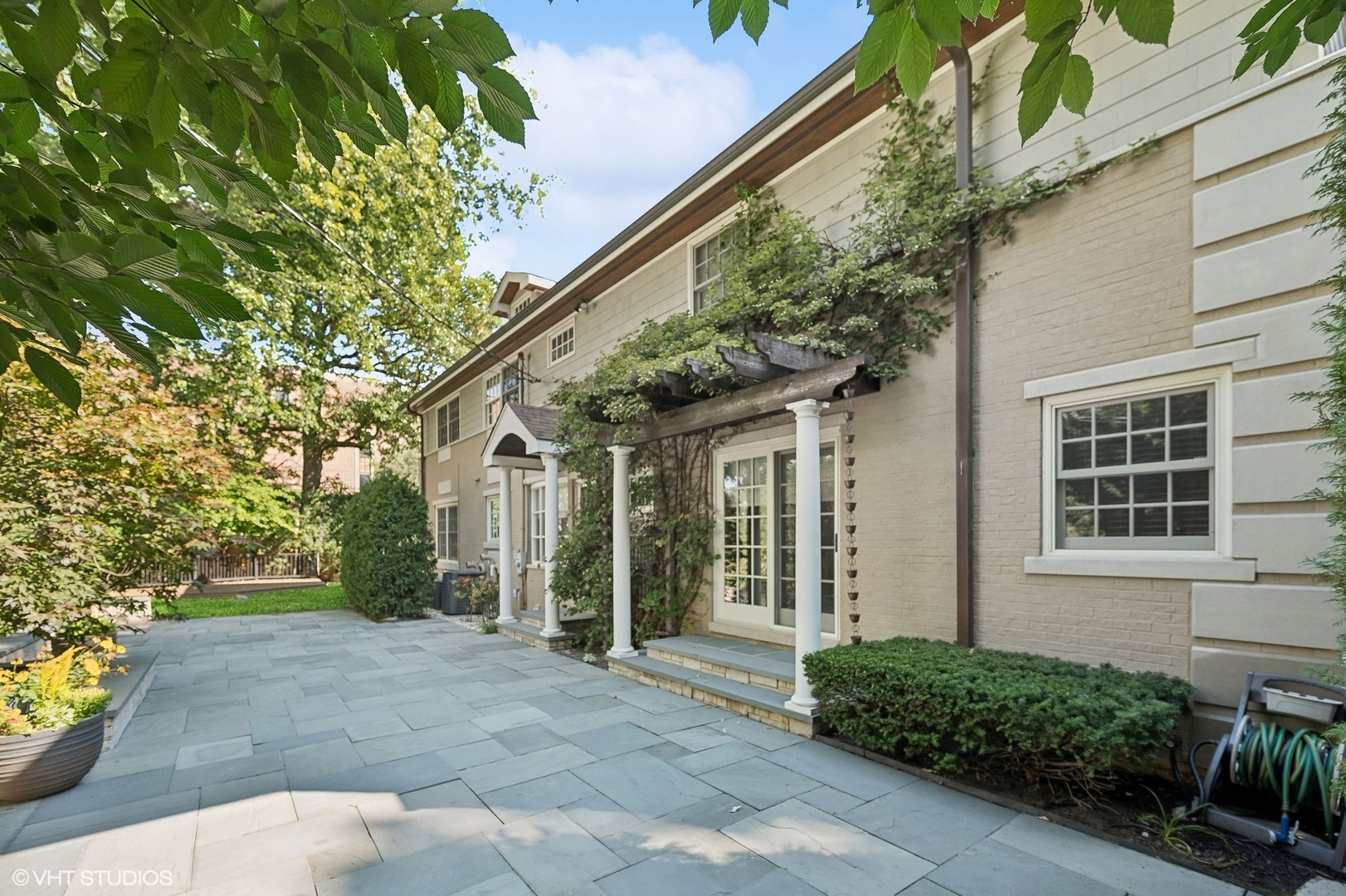 88 Abbotsford Road Winnetka, IL 60093 - Photo 21 of 46 a view of a house with a yard