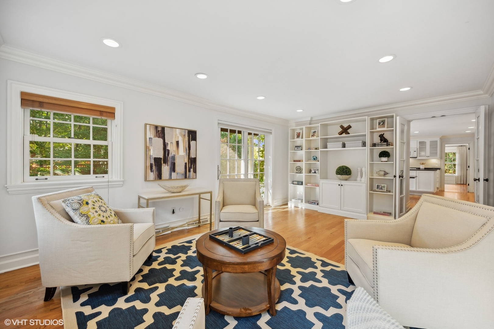 88 Abbotsford Road Winnetka, IL 60093 - Photo 23 of 46 a living room with furniture and a large window