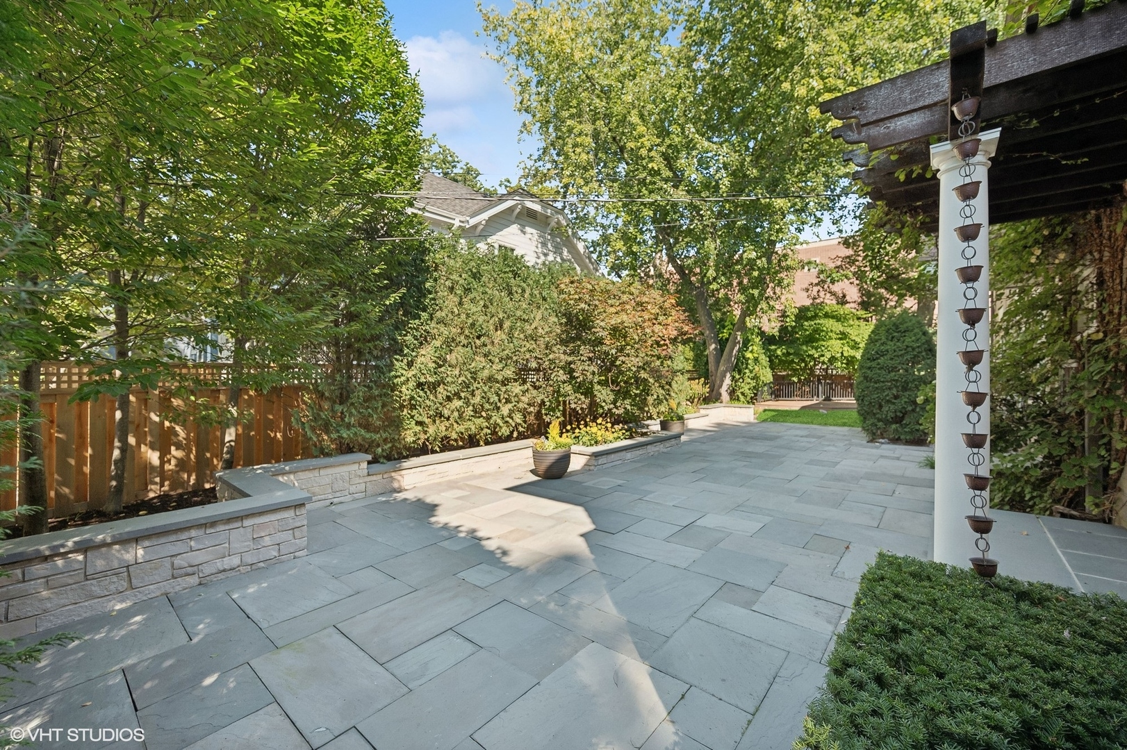 88 Abbotsford Road Winnetka, IL 60093 - Photo 25 of 46 a view of a backyard with large trees