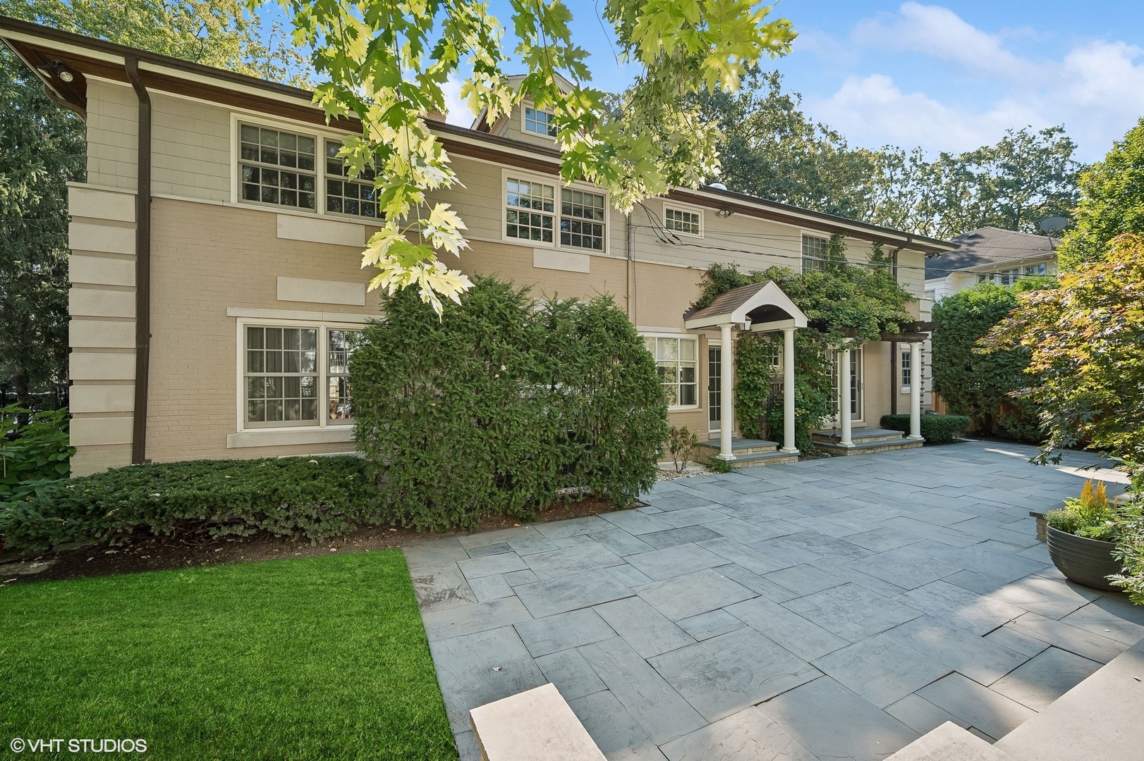 88 Abbotsford Road Winnetka, IL 60093 - Photo 26 of 46 a view of a house with a yard