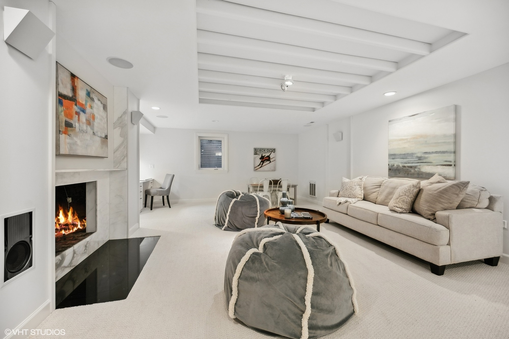 88 Abbotsford Road Winnetka, IL 60093 - Photo 37 of 46 a living room with furniture and a fireplace