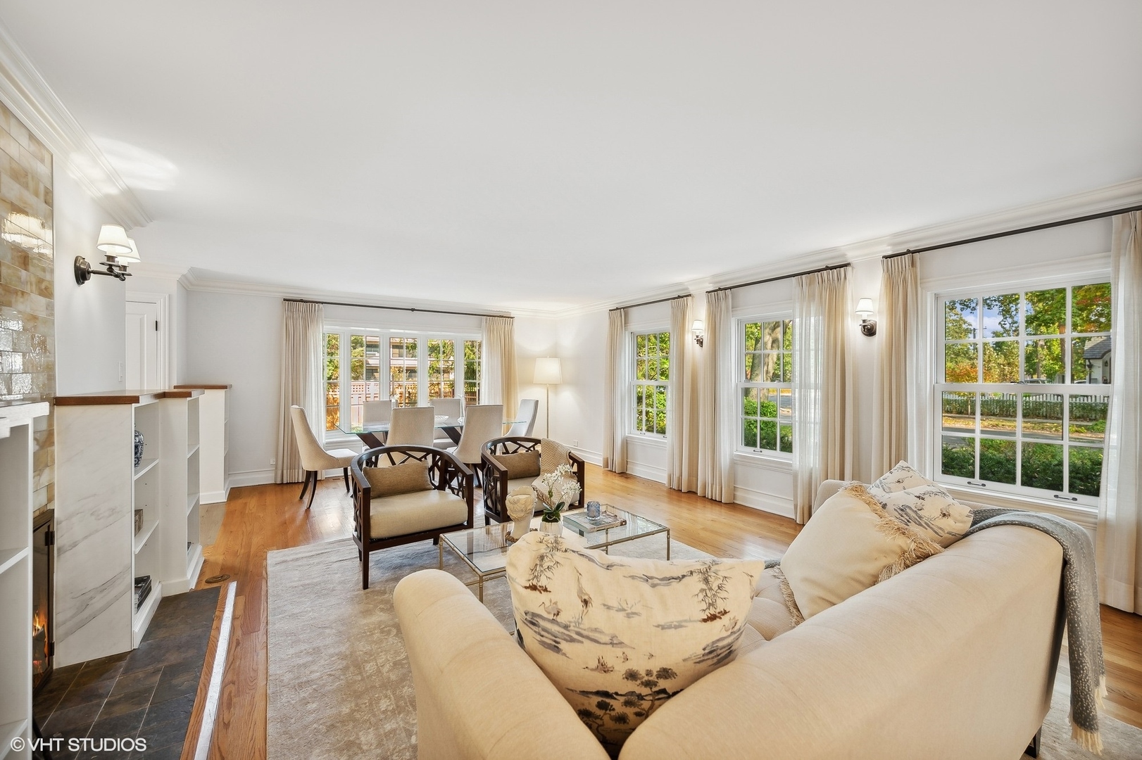 88 Abbotsford Road Winnetka, IL 60093 - Photo 9 of 46 a living room with furniture and large windows