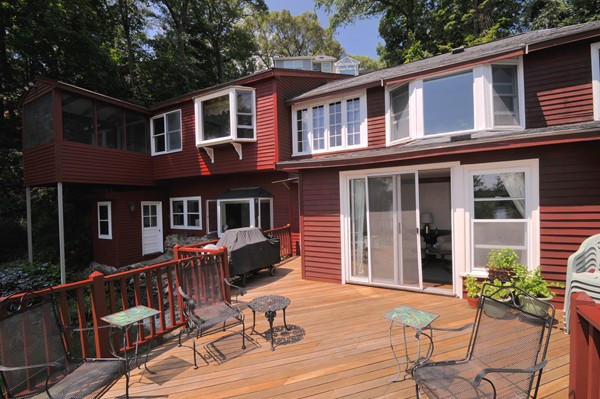 49 Shore Road Wellesley, MA 01760 - Photo 5 of 30 front view of a house with a patio