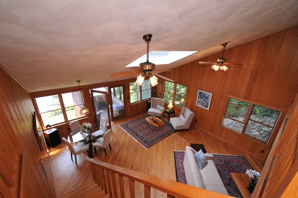 49 Shore Road Wellesley, MA 01760 - Photo 9 of 30 a bedroom with furniture and a chandelier