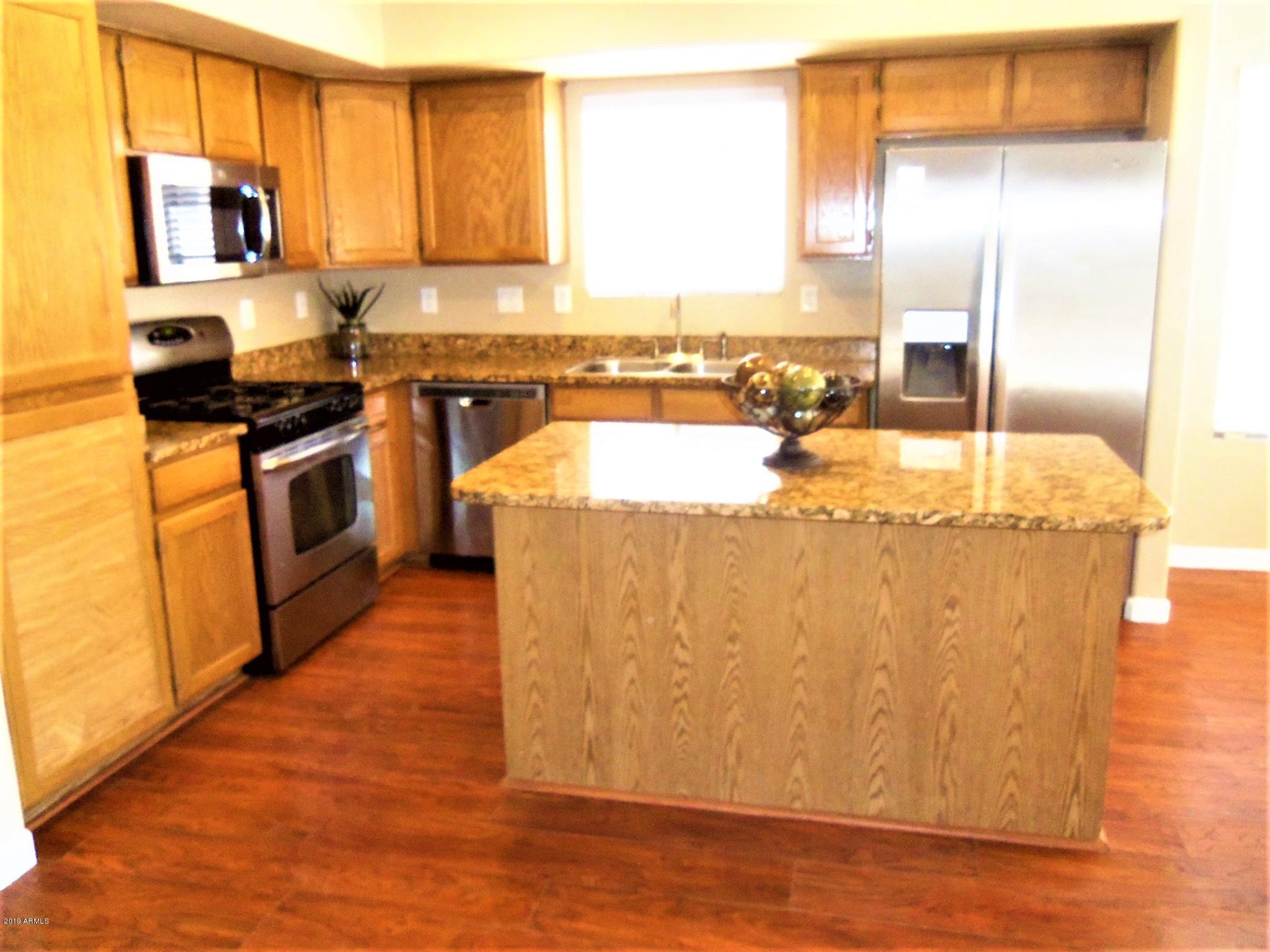 3947 East Douglas Loop Gilbert, AZ 85234 - Photo 8 of 14 Kitchen View 1