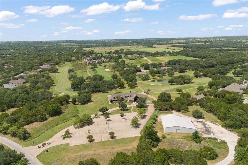 22212 Field Street Whitney, TX 76692 - Photo 12 of 32 an aerial view of residential houses with outdoor space