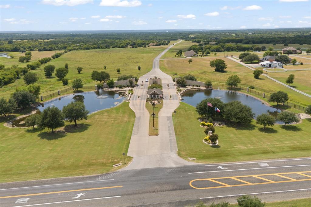 22212 Field Street Whitney, TX 76692 - Photo 13 of 32 an aerial view of residential houses with outdoor space