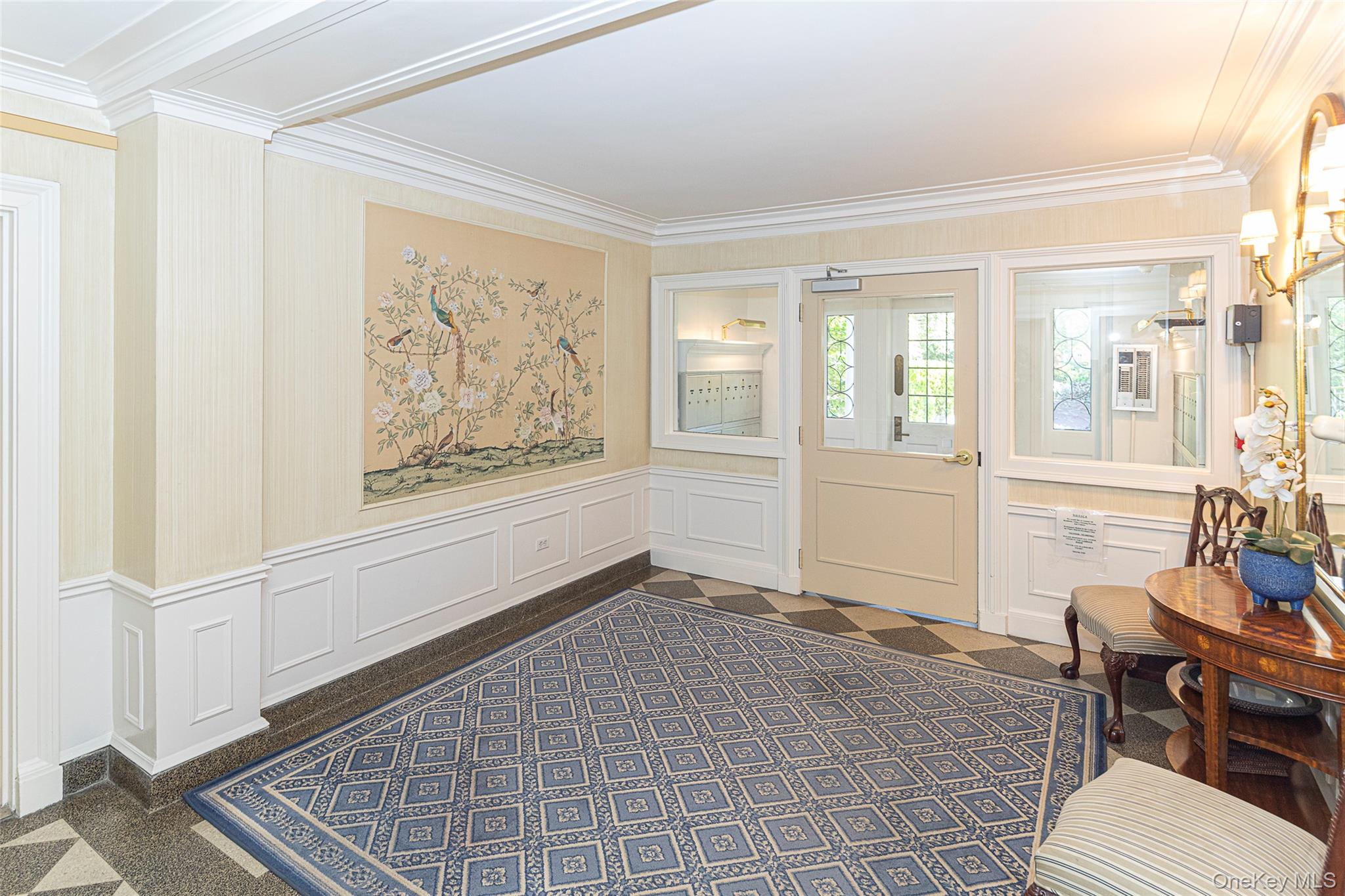 6 Midland Gardens, Unit 4B Bronxville, NY 10708 - Photo 13 of 16 a view of a livingroom with furniture and windows