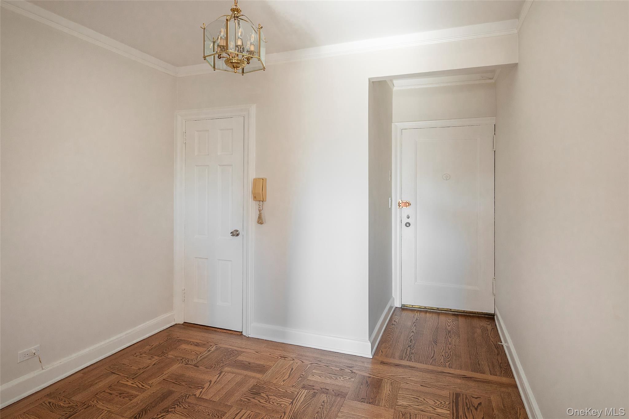 6 Midland Gardens, Unit 4B Bronxville, NY 10708 - Photo 4 of 16 an empty room with closet