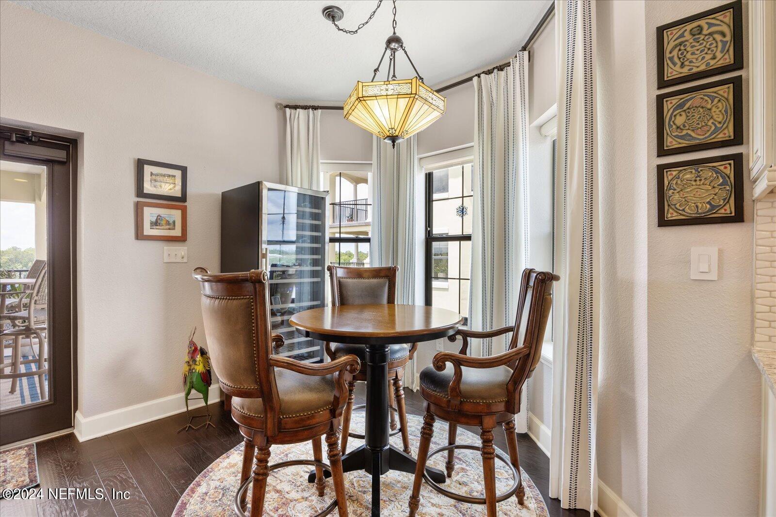 3958 Baymeadows Road, Unit 4501 Jacksonville, FL 32217 - Photo 27 of 57 a dining room with furniture and window