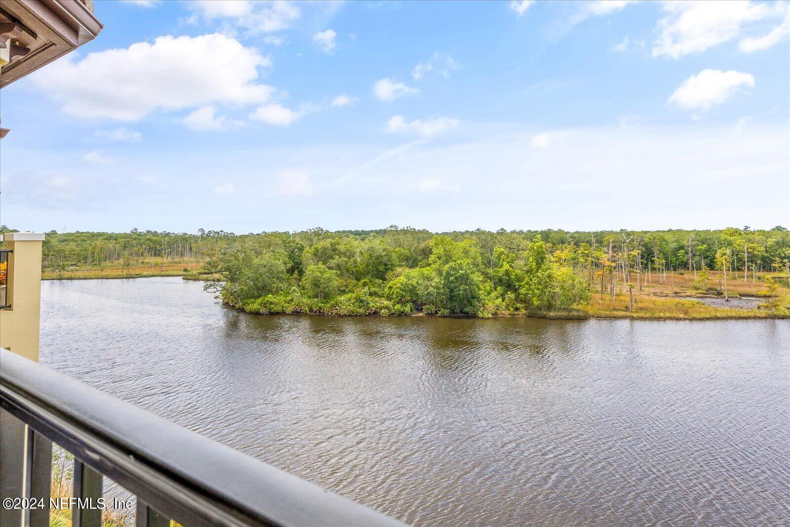 3958 Baymeadows Road, Unit 4501 Jacksonville, FL 32217 - Photo 30 of 57 a view of a lake with a city