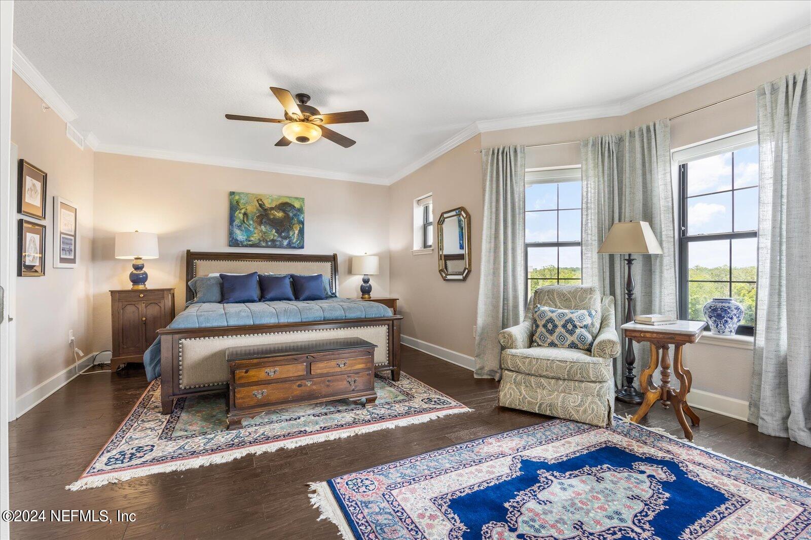 3958 Baymeadows Road, Unit 4501 Jacksonville, FL 32217 - Photo 36 of 57 a bedroom with a bed a couch and a window