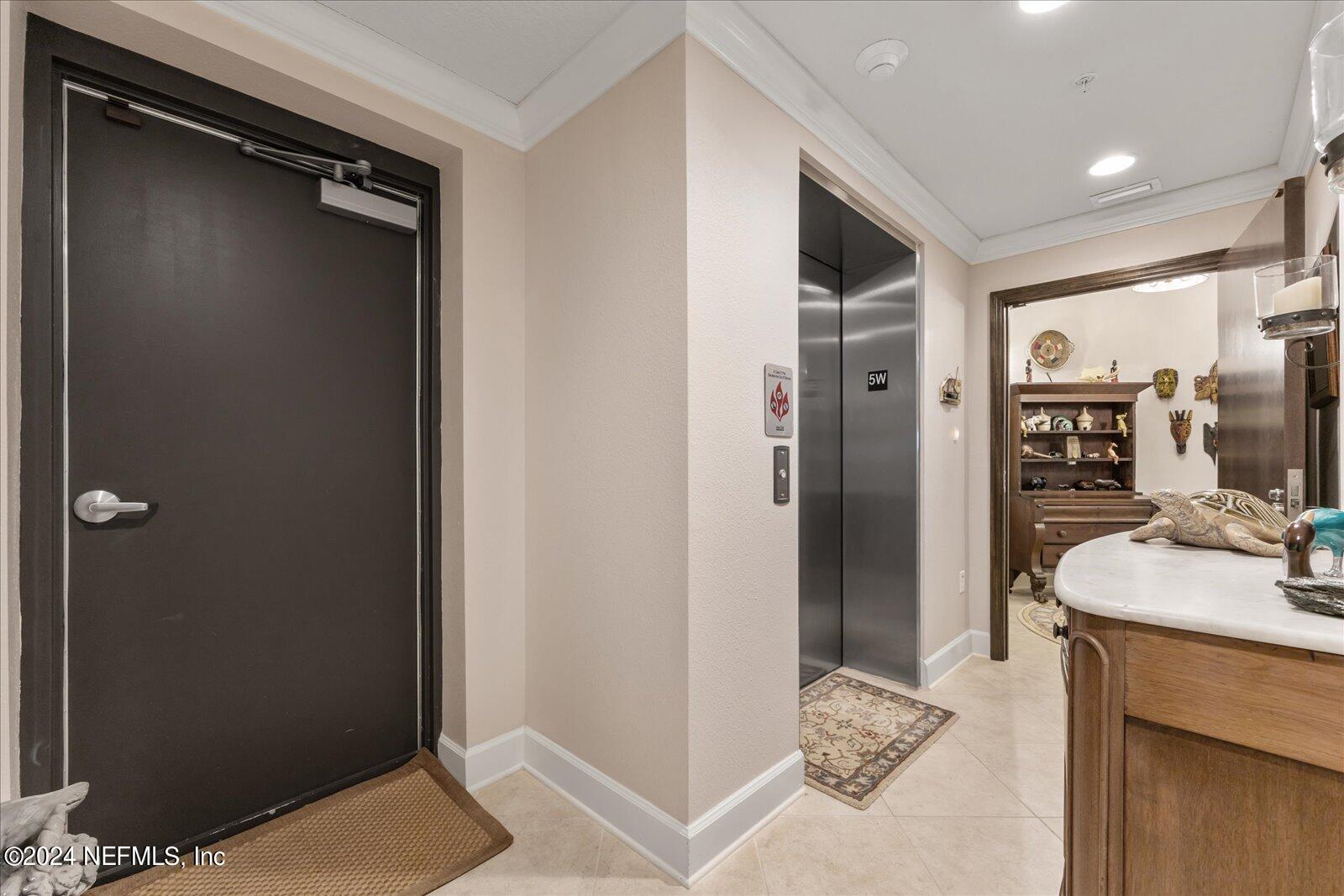 3958 Baymeadows Road, Unit 4501 Jacksonville, FL 32217 - Photo 9 of 57 a bathroom with a sink and a mirror