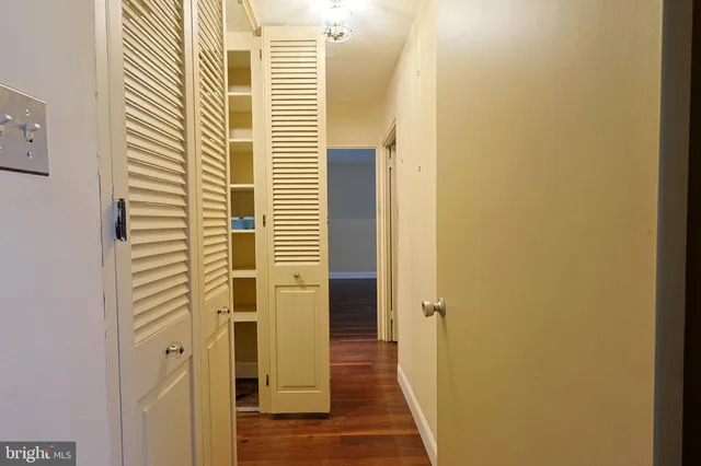 a view of a bathroom from a hallway