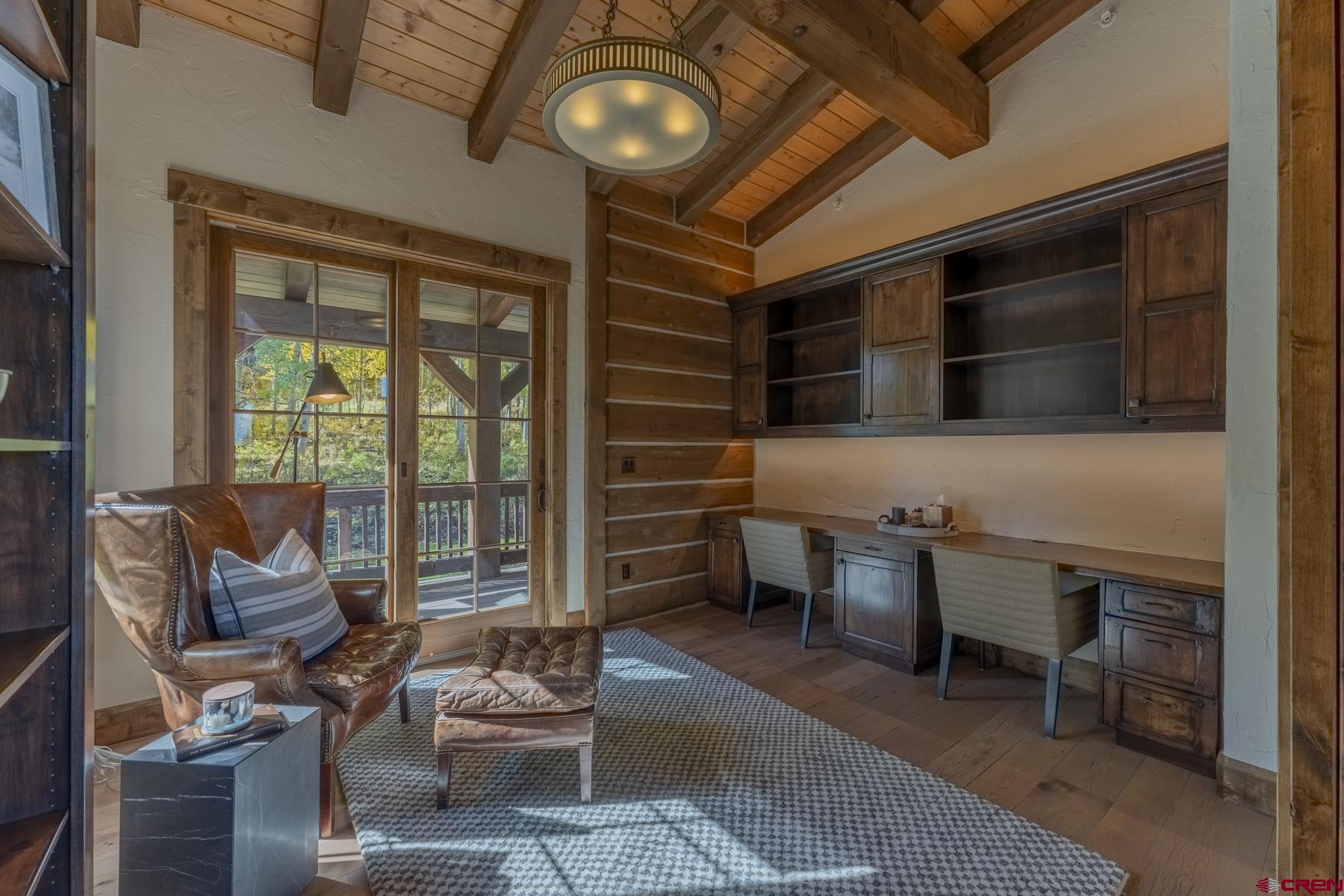 1610 Red Mountain Ranch Road Crested Butte, CO 81224 - Photo 17 of 35 a living room with furniture and a window