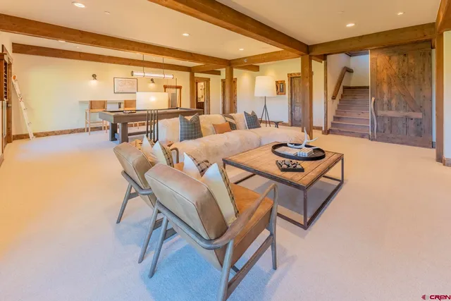 a bedroom with a bed and a table in it