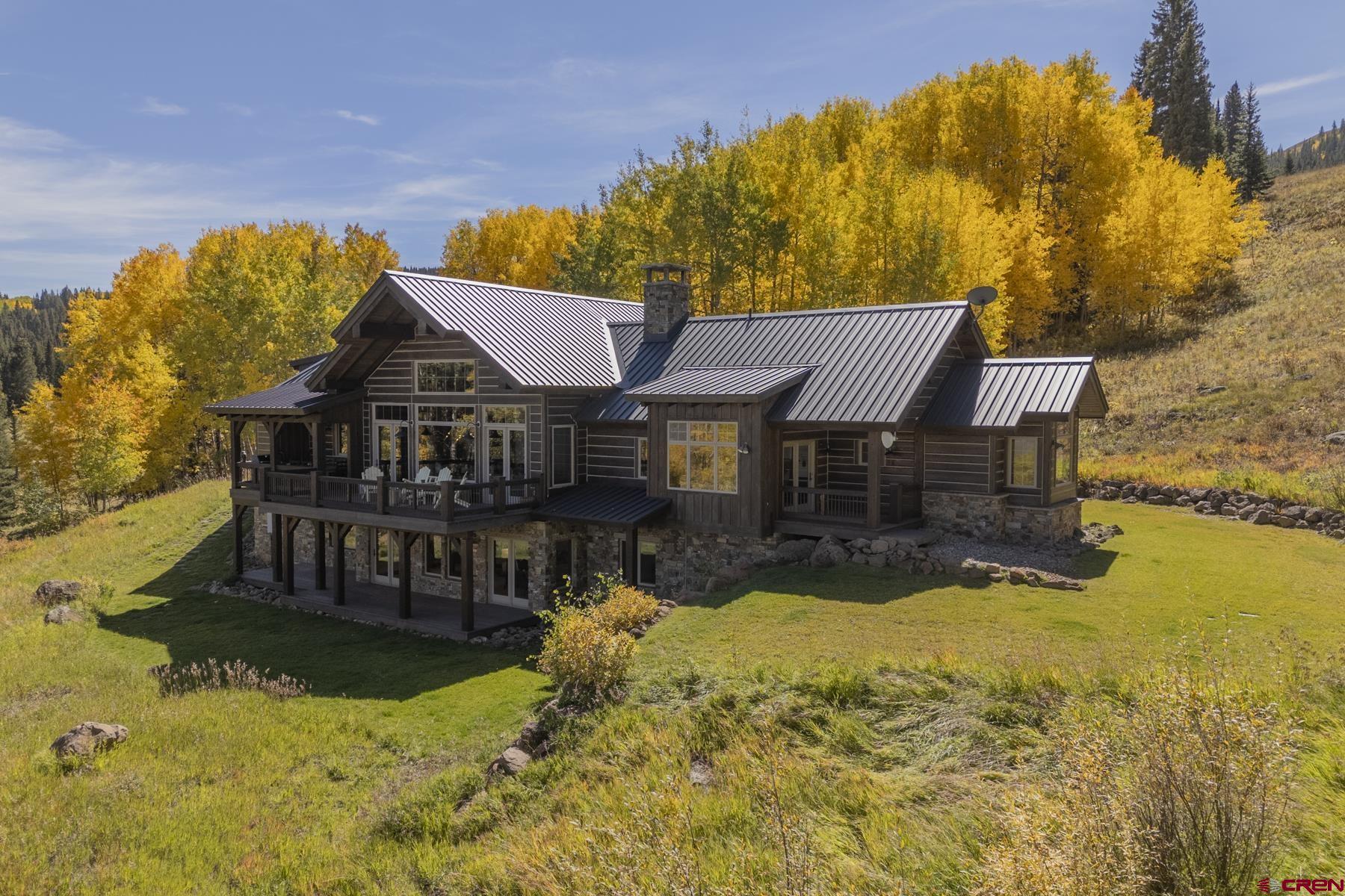 1610 Red Mountain Ranch Road Crested Butte, CO 81224 - Photo 3 of 35 a view of swimming pool with a garden
