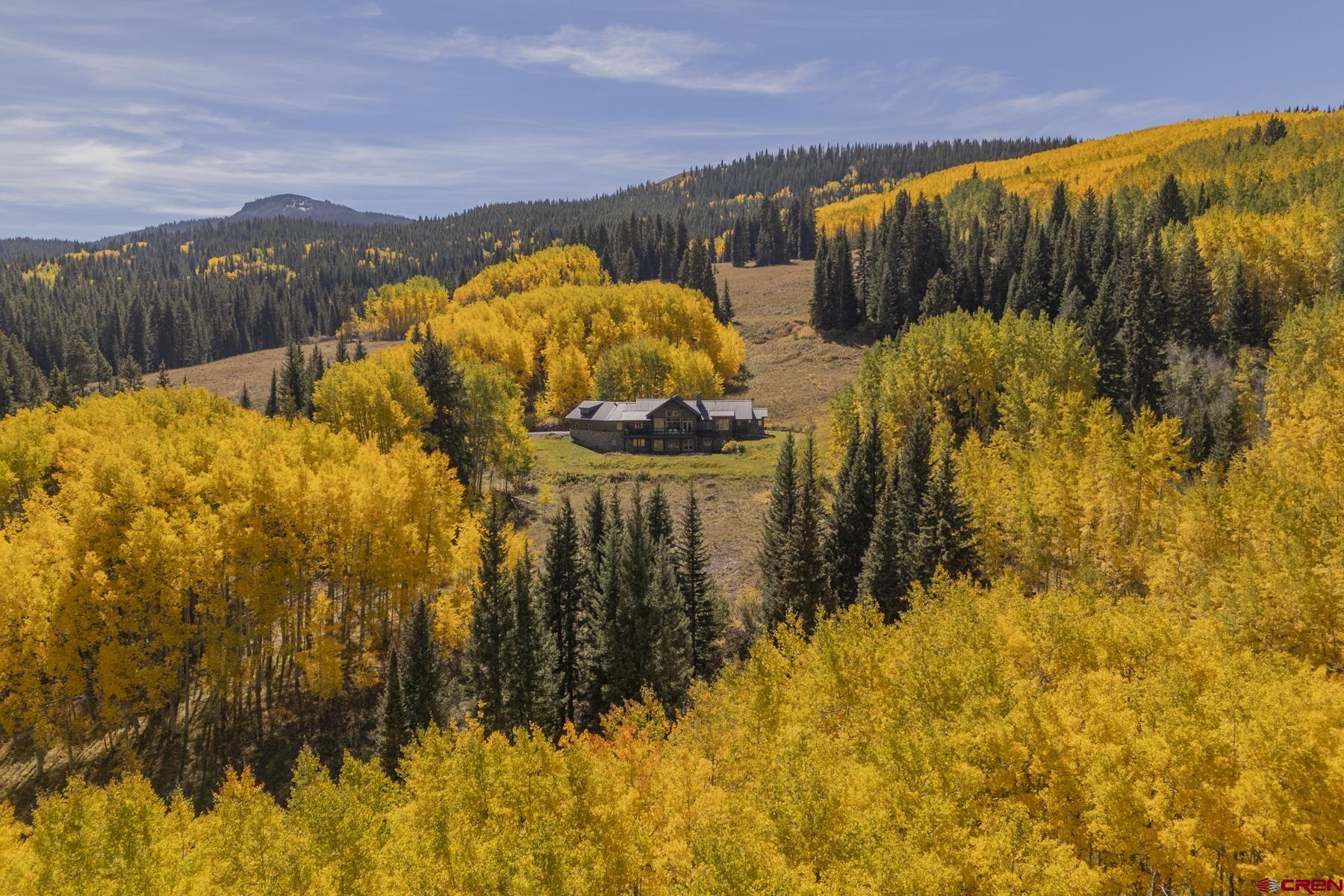 1610 Red Mountain Ranch Road Crested Butte, CO 81224 - Photo 5 of 35 a view of a large body of water with a building in the background