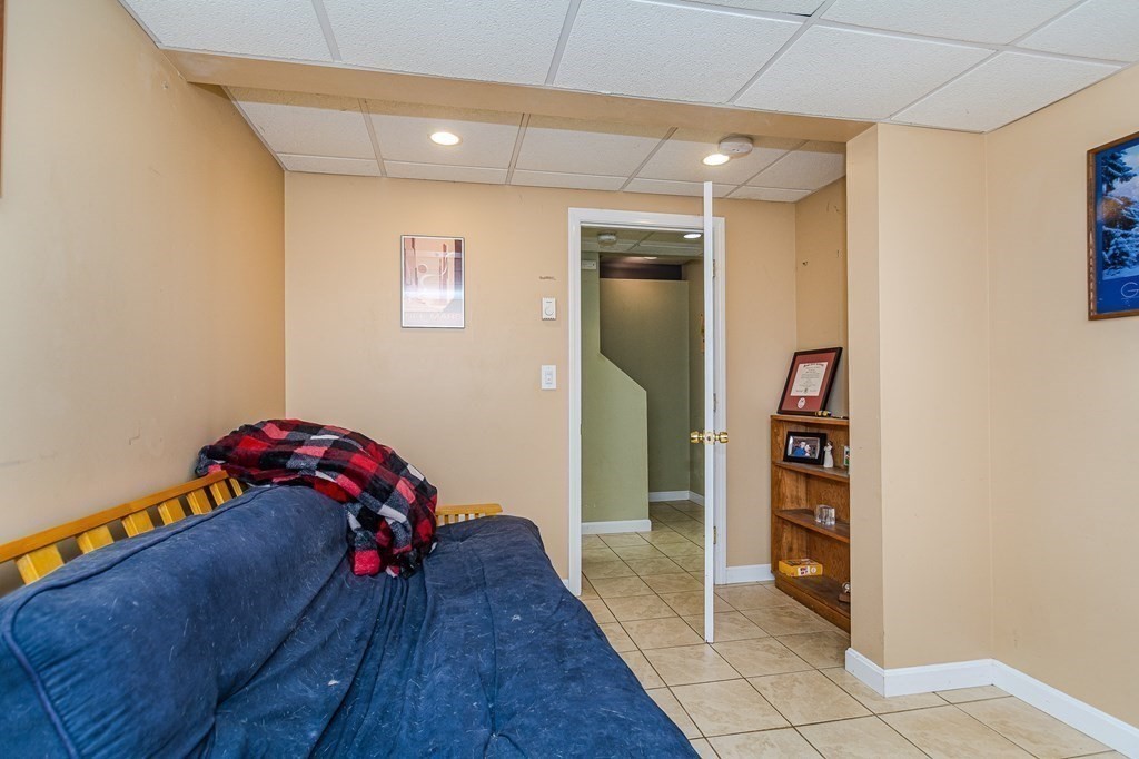 193 Acropolis Road Lowell, MA 01854 - Photo 27 of 39 a view of a livingroom with wooden floor