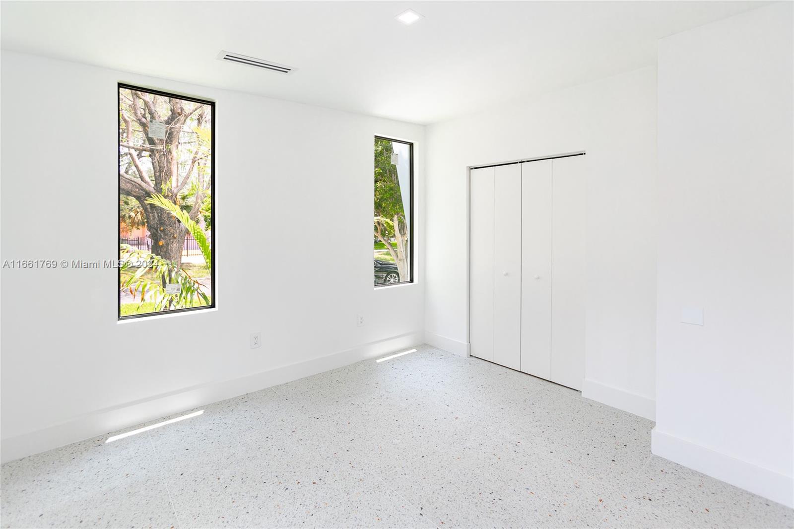 170 Southwest 38th Court Miami, FL 33134 - Photo 18 of 37 an empty room with windows