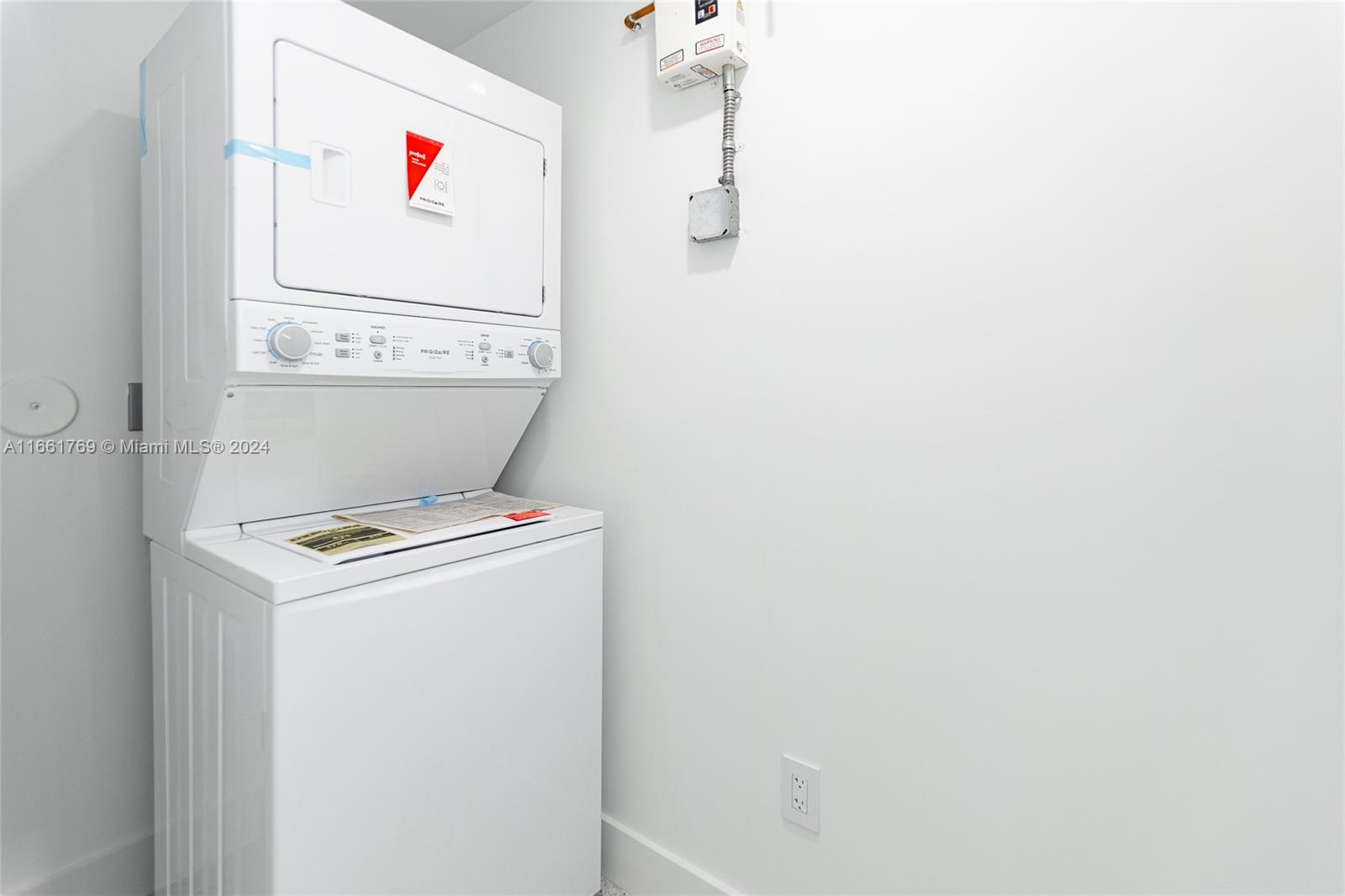 170 Southwest 38th Court Miami, FL 33134 - Photo 20 of 37 a utility room with dryer and washer