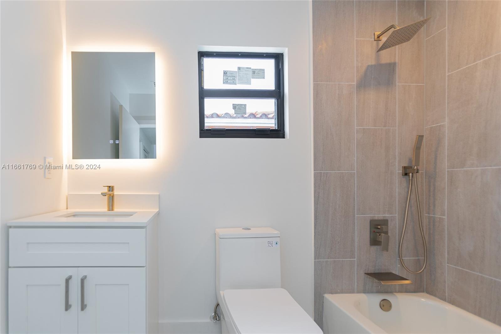 170 Southwest 38th Court Miami, FL 33134 - Photo 22 of 37 a bathroom with a sink a toilet and shower