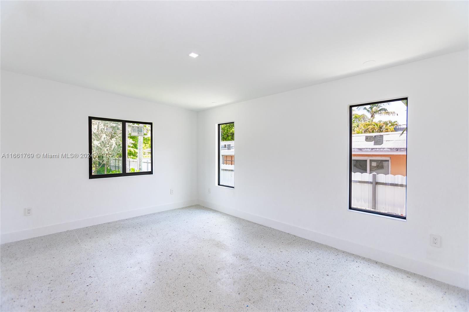 170 Southwest 38th Court Miami, FL 33134 - Photo 36 of 37 an empty room with windows