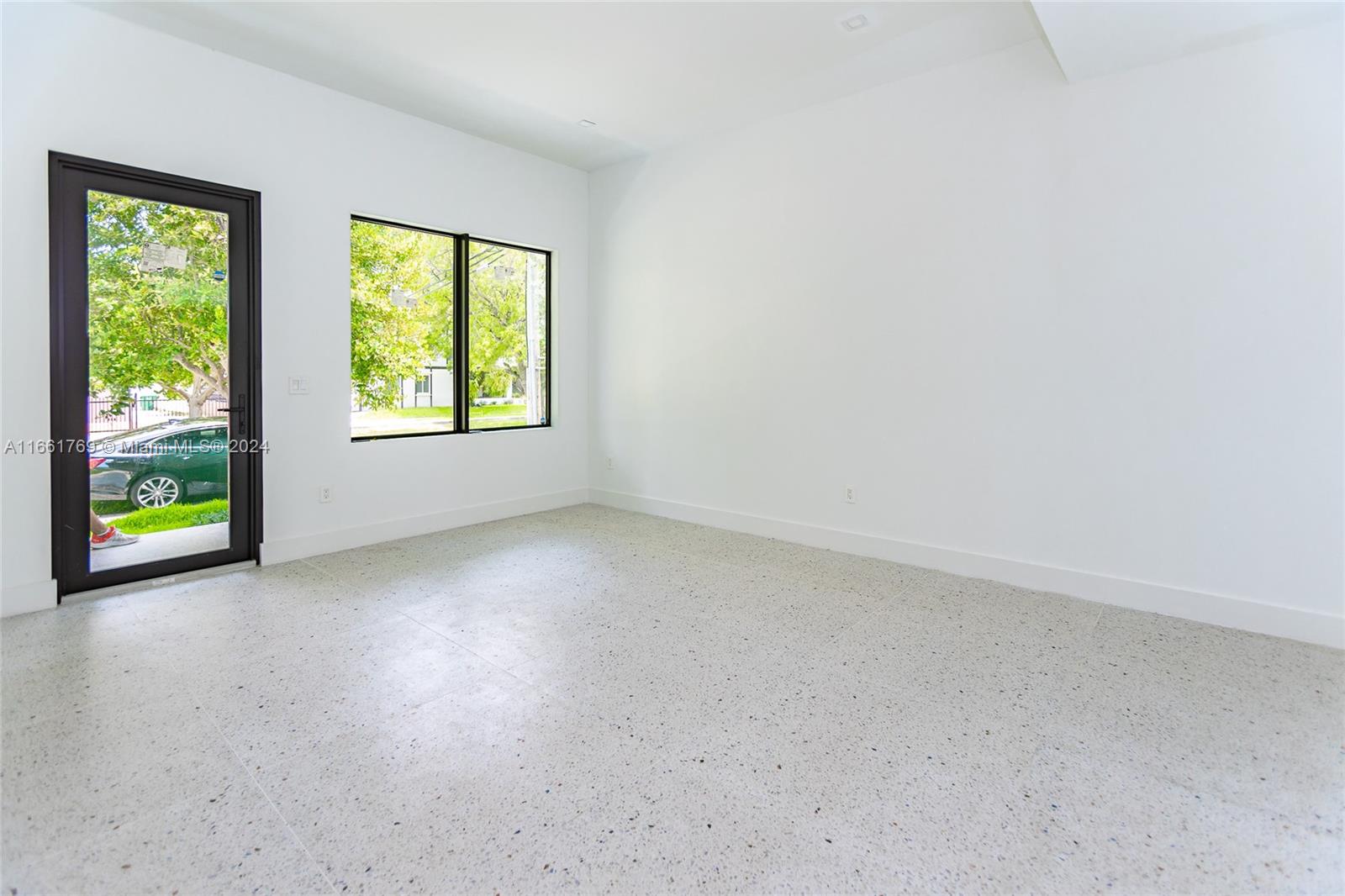 170 Southwest 38th Court Miami, FL 33134 - Photo 37 of 37 an empty room with windows