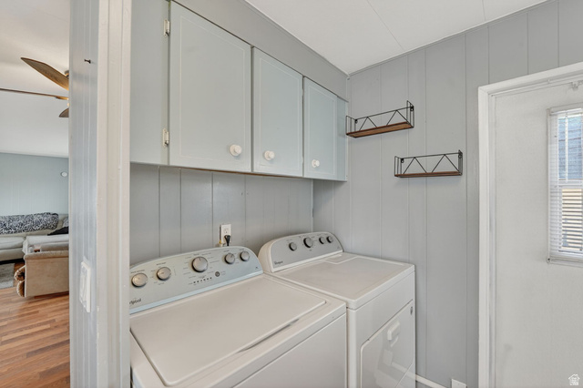 24 Grover Street Layton, UT 84041 - Photo 16 of 21 Laundry room with separate washer and dryer, a decorative wall, wood walls, cabinet space, and a ceiling fan