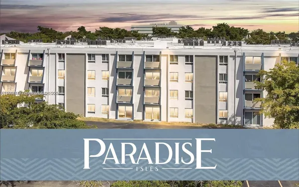 a view of kitchen with stainless steel appliances kitchen island granite countertop a refrigerator and cabinets