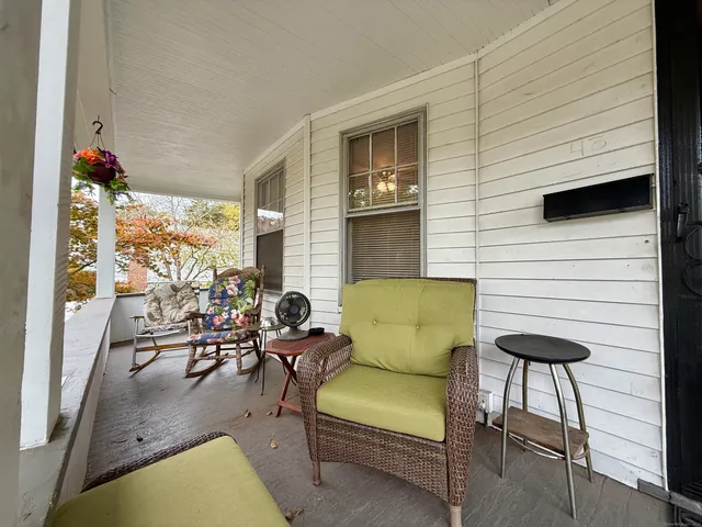 a building outdoor space with patio furniture