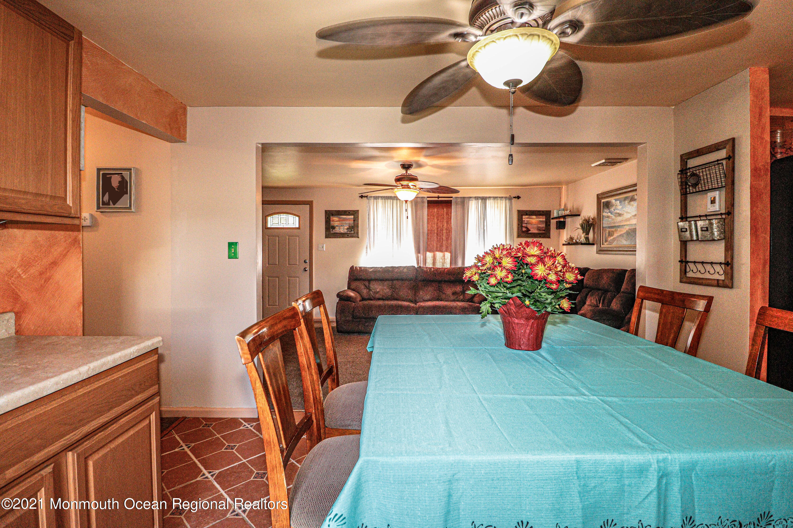94 London Road Brick, NJ 08723 - Photo 12 of 43 a dining room with furniture and chandelier
