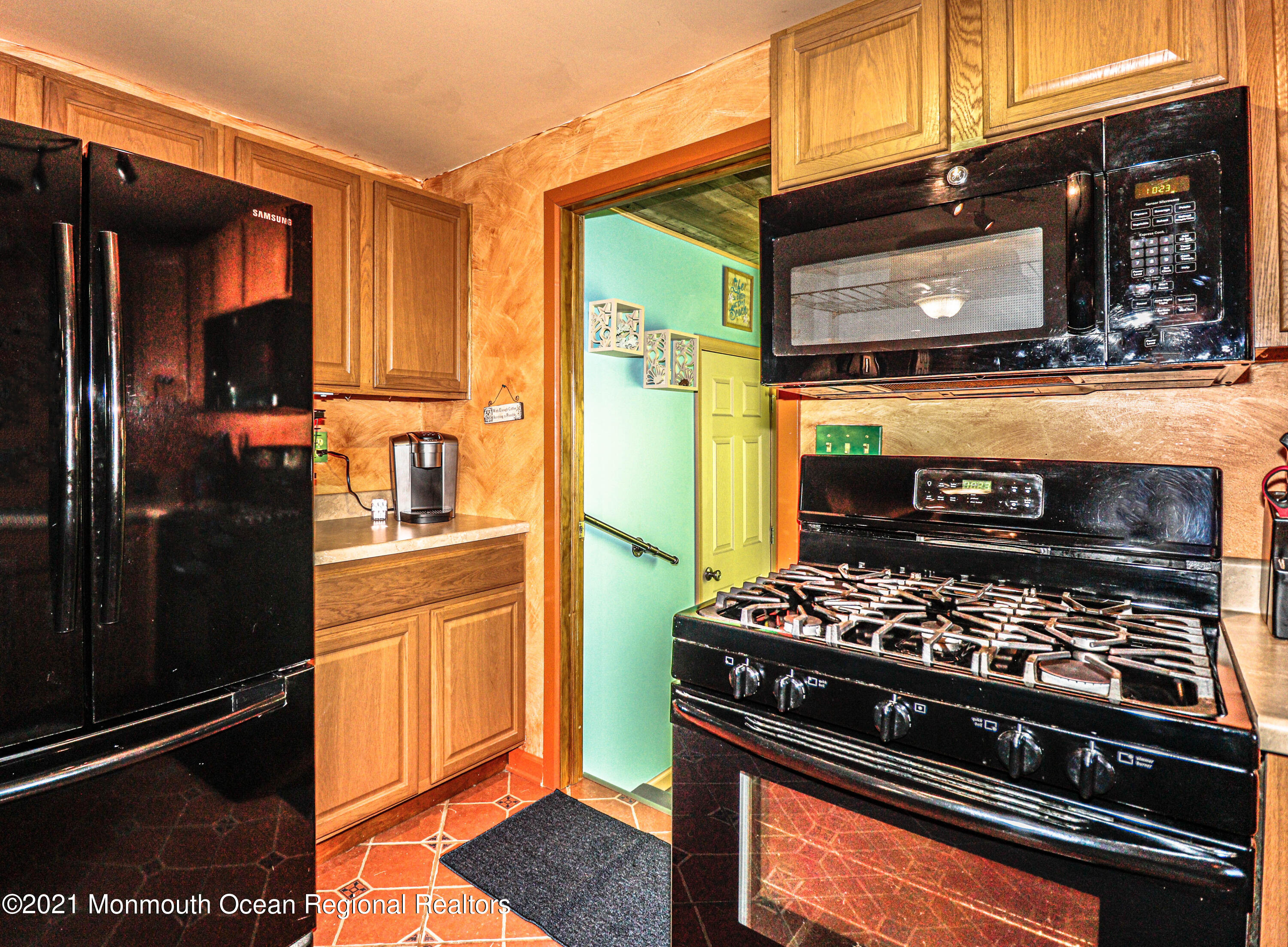 94 London Road Brick, NJ 08723 - Photo 13 of 43 a kitchen with stainless steel appliances granite countertop a stove and a microwave