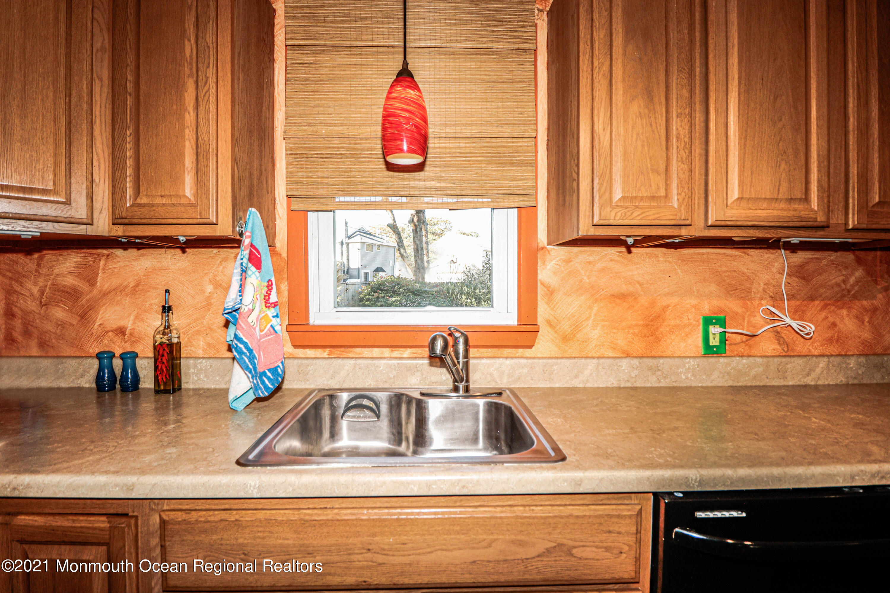 94 London Road Brick, NJ 08723 - Photo 14 of 43 a kitchen with a sink and a window