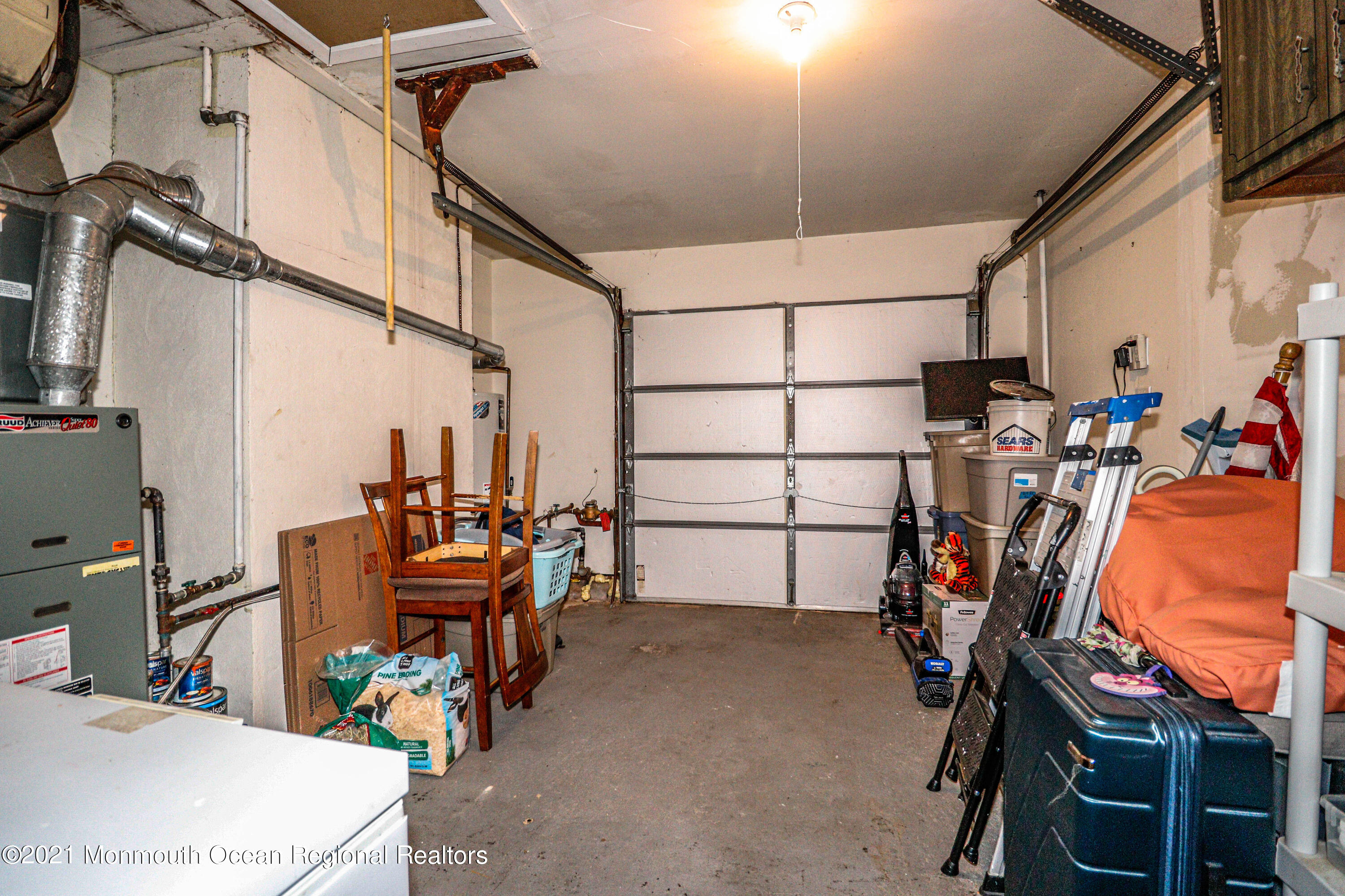 94 London Road Brick, NJ 08723 - Photo 23 of 43 a view of a storage room with a lot of stuff