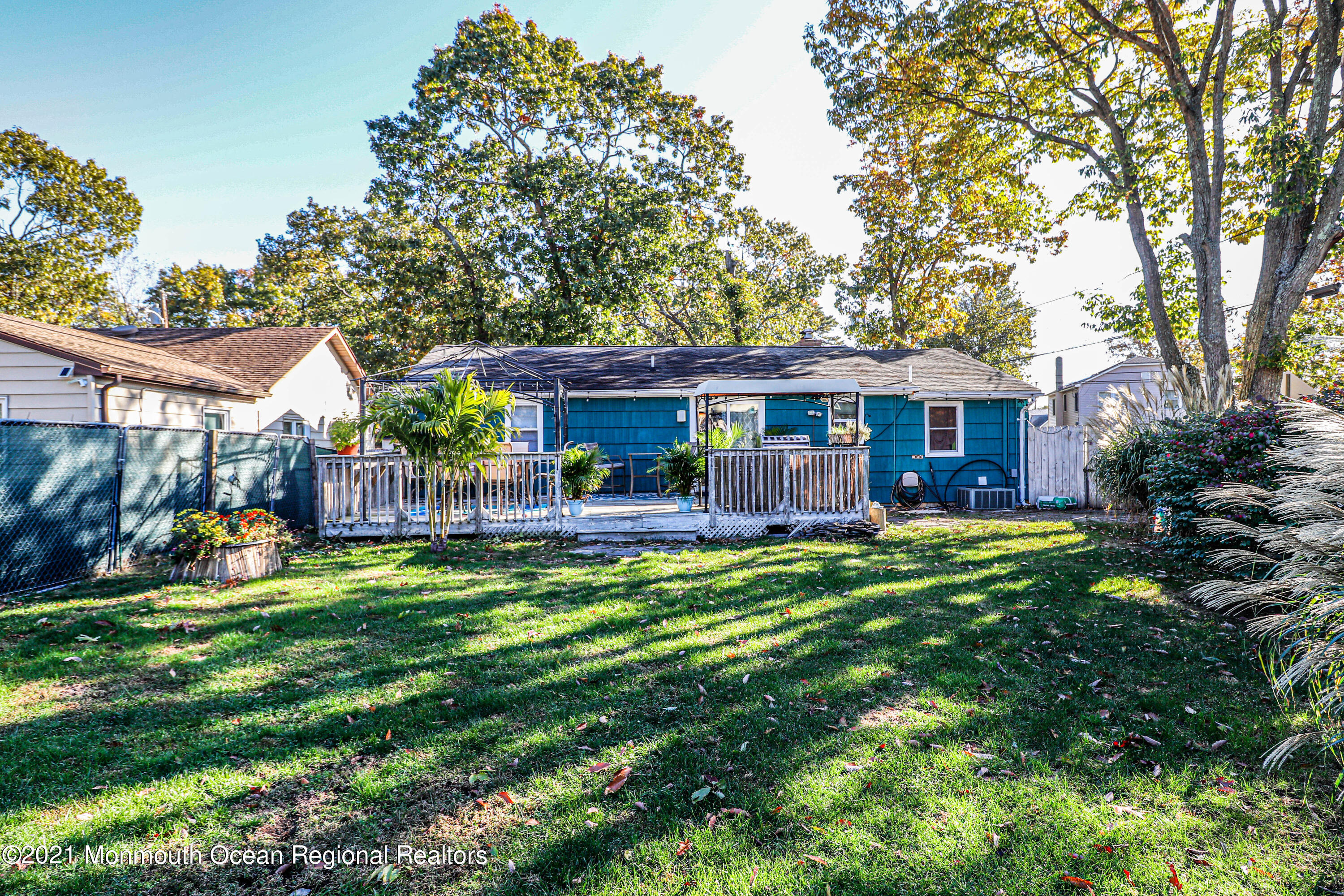 94 London Road Brick, NJ 08723 - Photo 24 of 43 a view of a house with a yard and sitting area