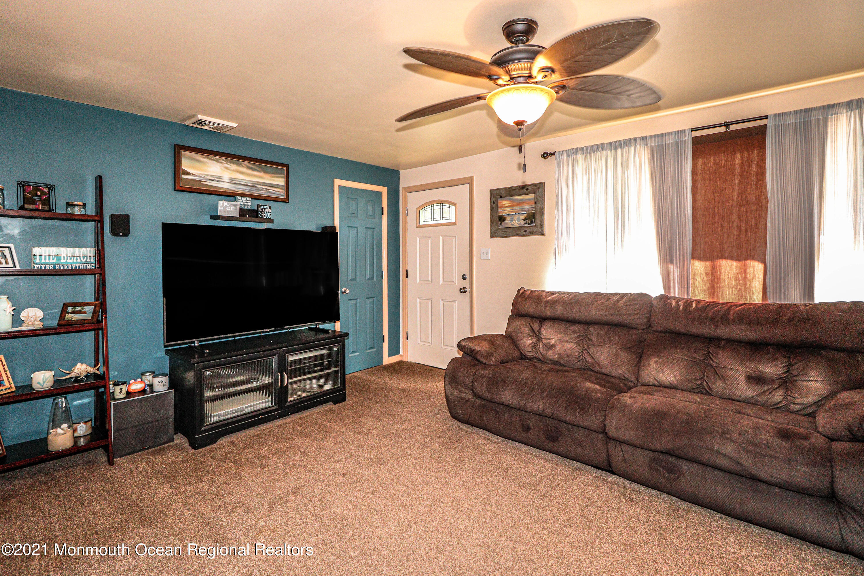 94 London Road Brick, NJ 08723 - Photo 8 of 43 a living room with furniture and a flat screen tv