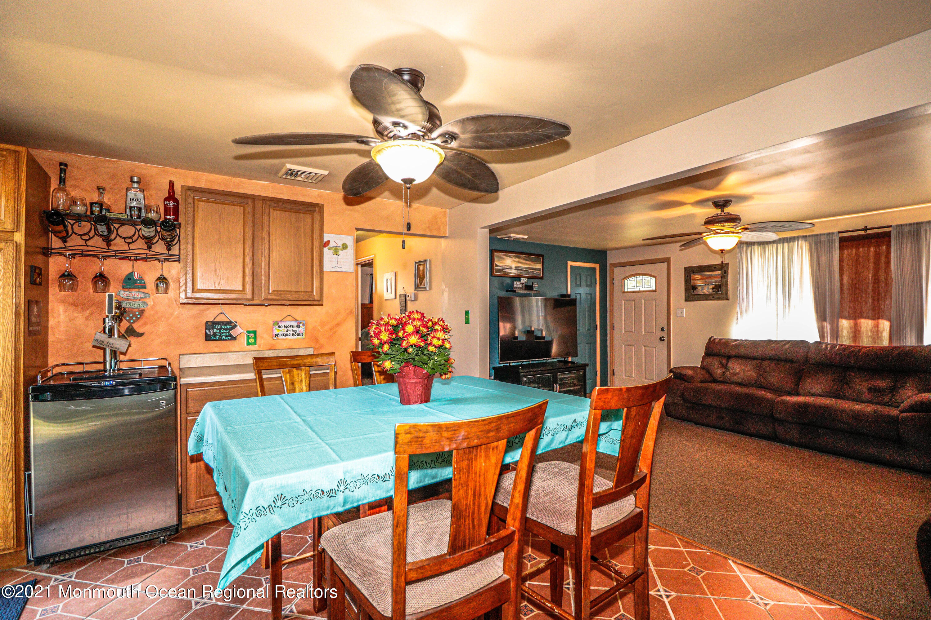 94 London Road Brick, NJ 08723 - Photo 10 of 43 a view of a dining room with furniture and a chandelier