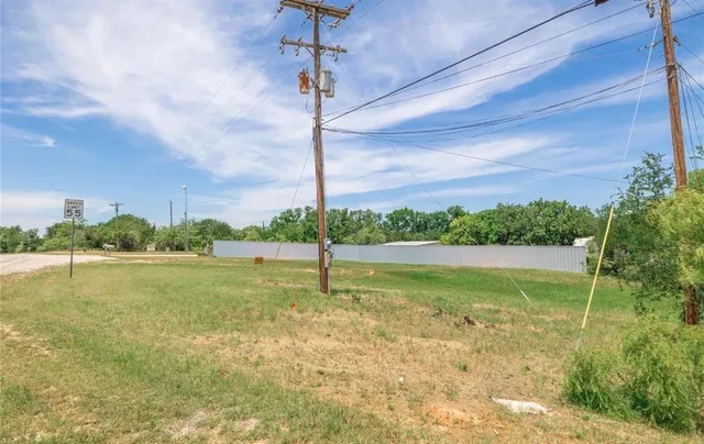 a view of a lake with a big yard