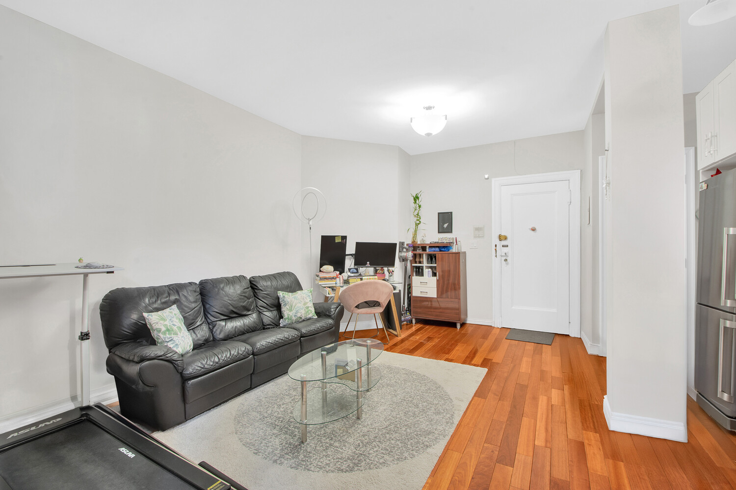 255 79th Street, Unit A7 Brooklyn, NY 11209 - Photo 5 of 7 a living room with furniture and a wooden floor