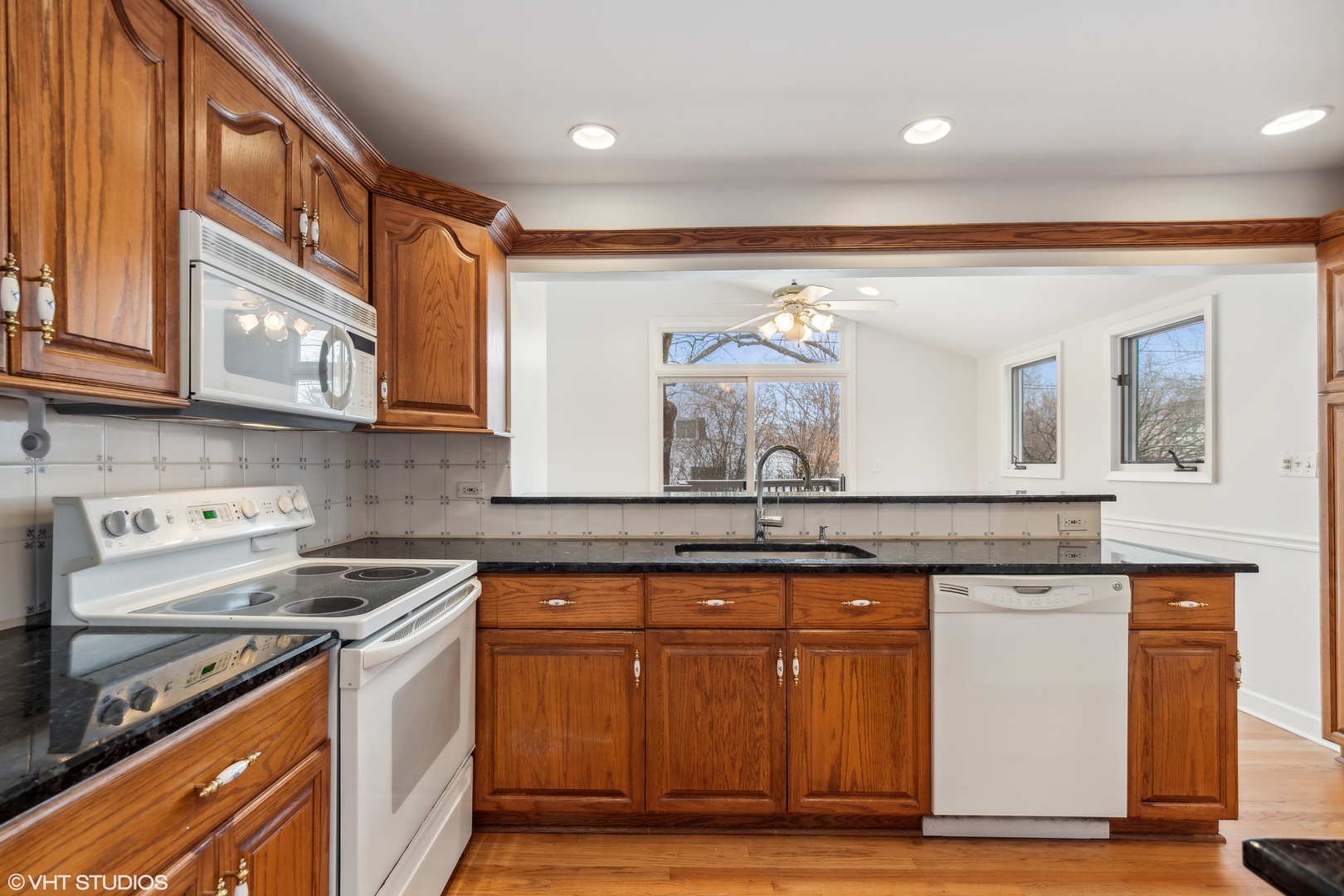36 Forestway Drive Deerfield, IL 60015 - Photo 11 of 37 a kitchen with stainless steel appliances granite countertop a stove and a sink