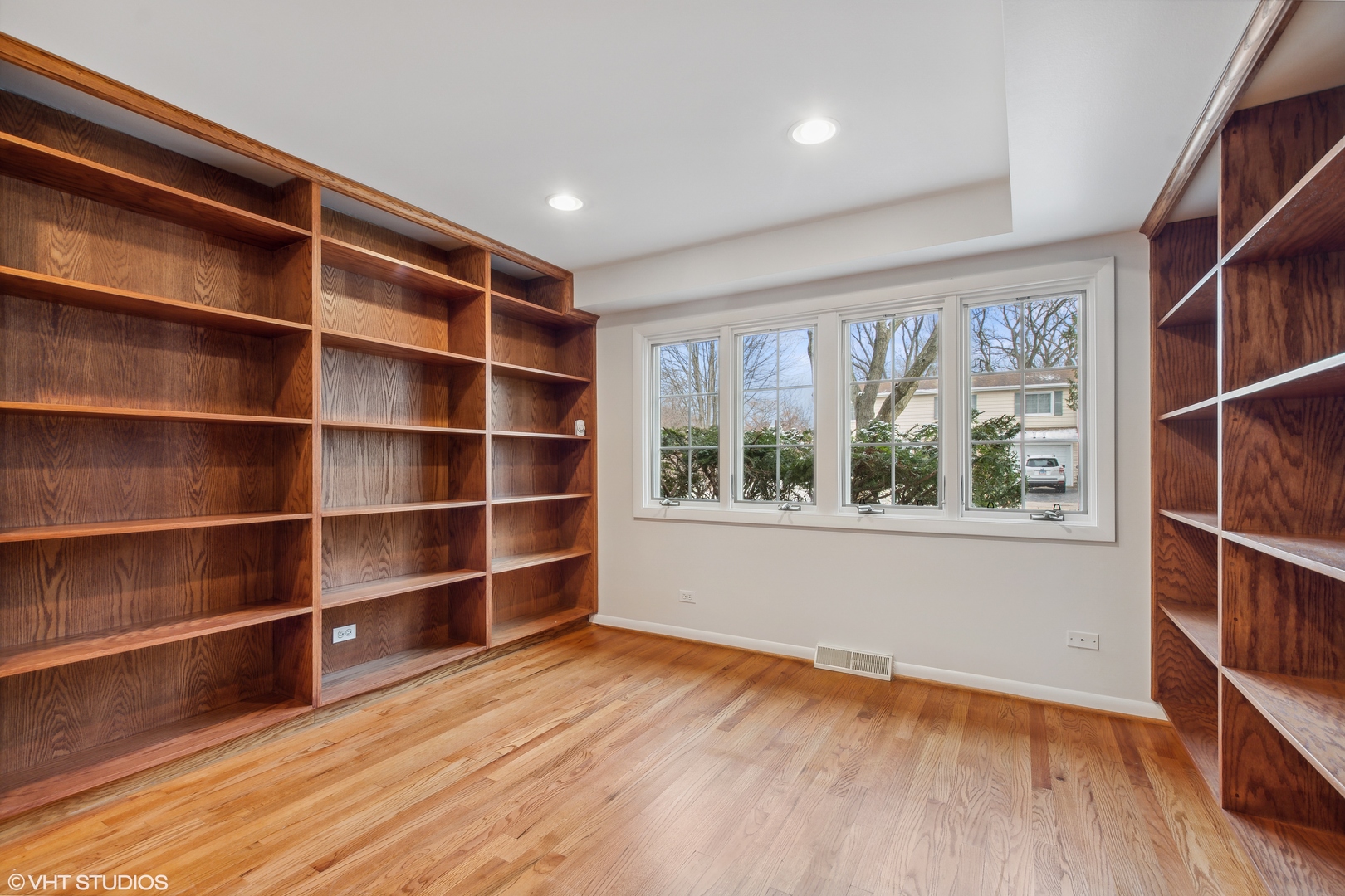 36 Forestway Drive Deerfield, IL 60015 - Photo 18 of 37 a view of an empty room with a window and wooden floor
