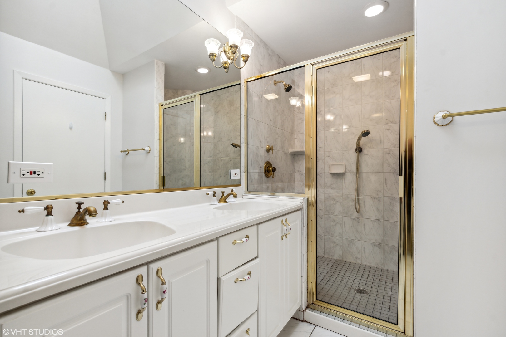 36 Forestway Drive Deerfield, IL 60015 - Photo 21 of 37 a bathroom with a shower sink vanity granite and shower